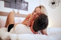 Handsome couple in bed being sensual Royalty Free Stock Photo