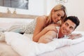 Handsome couple in bed being sensual Royalty Free Stock Photo