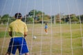 Handsome dad with his little are having fun and playing football Royalty Free Stock Photo