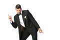 handsome dancing young groom isolated