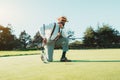 African golf player on the field Royalty Free Stock Photo