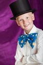 Handsome dapper young boy in a top hat Royalty Free Stock Photo