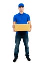 Handsome delivery man holding parcel box