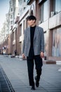 Handsome eastern man in suit, fashion, street style. Royalty Free Stock Photo