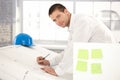 Handsome engineer drawing plans Royalty Free Stock Photo