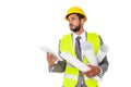 Handsome engineer holding blueprints and digital tablet while looking away Royalty Free Stock Photo