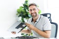 Handsome engineer repairing laptop computer. Royalty Free Stock Photo