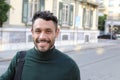 Handsome entrepreneur walking around with elegant turtle neck shirt Royalty Free Stock Photo