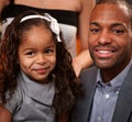 Handsome ethnic man and little daughter