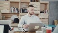 Handsome European young businessman leading multiethnic office meeting. Confident boss gives directions, panning shot 4K Royalty Free Stock Photo