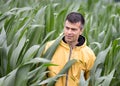 Farmer in corn field Royalty Free Stock Photo