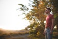 Handsome fit man posing in forest