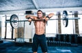 Handsome fitness man lifting barbell