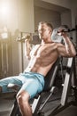 Handsome fitness man weightlifting workout in gym Royalty Free Stock Photo