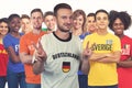 Handsome german football fan with group of other european supporters