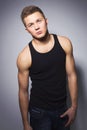 Handsome gorgeous young man in shirt indoor