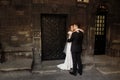 Handsome groom hugging bride, newlywed couple, blonde wife and s Royalty Free Stock Photo