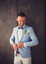 Handsome groom standing in a jacket Royalty Free Stock Photo