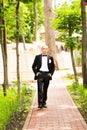 Handsome groom at wedding tuxedo smiling and Royalty Free Stock Photo