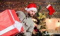 Handsome guy with giant gift box. I am here to give present. Delivering happiness to your home. Delivery service. Spread Royalty Free Stock Photo