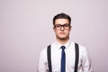 Handsome guy in glasses and white shirt isolated on white background