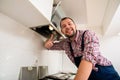 Handsome guy work on ventilation Royalty Free Stock Photo
