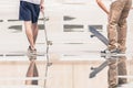 Handsome guys with skateboard at freestyle park outdoors