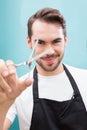 Handsome hair stylist looking at camera Royalty Free Stock Photo