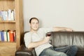 Handsome happy man relaxing with a glass of wine Royalty Free Stock Photo