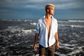 Handsome happy man wearing white shirt at the sea or the ocean background Royalty Free Stock Photo