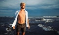 Handsome happy man wearing white shirt at the sea or the ocean background Royalty Free Stock Photo