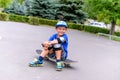 Handsome happy young boy on his skateboard Royalty Free Stock Photo