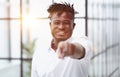 Handsome happy young man pointing at camera Royalty Free Stock Photo