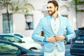 Handsome hipster man in suit in the street Royalty Free Stock Photo