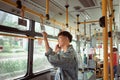 Handsome hipster modern man calling by mobile phone in bus Royalty Free Stock Photo