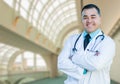 Handsome Hispanic Male Doctor or Nurse Inside Hospital Building Royalty Free Stock Photo