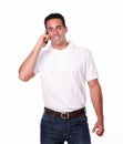 Handsome hispanic man talking on his mobile Royalty Free Stock Photo