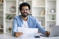 Handsome Indian Male Freelancer Working With Papers At Home Office Royalty Free Stock Photo