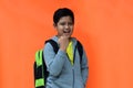 handsome indonesian boy with happy expression when going to school. Royalty Free Stock Photo