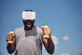 Handsome international man using new gadget for training