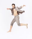 Handsome jumping man on suit isolated on a white background Royalty Free Stock Photo