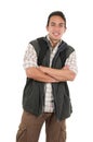 Handsome latin young man wearing backpack and vest Royalty Free Stock Photo