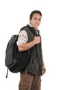 Handsome latin young man wearing backpack and vest Royalty Free Stock Photo