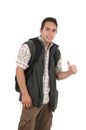 Handsome latin young man wearing backpack and vest Royalty Free Stock Photo