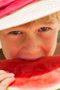 Boy eating red ripe watermelon. Summertime, holidays and vacations concept Royalty Free Stock Photo