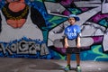 Handsome little boy holding his skateboard Royalty Free Stock Photo