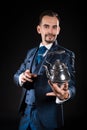 A handsome magician in a blue dress Royalty Free Stock Photo