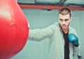 Handsome male boxer trains