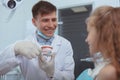 Handsome male dentist working at his clinic Royalty Free Stock Photo