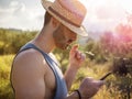 Handsome male farmer outdoor with cell phone Royalty Free Stock Photo